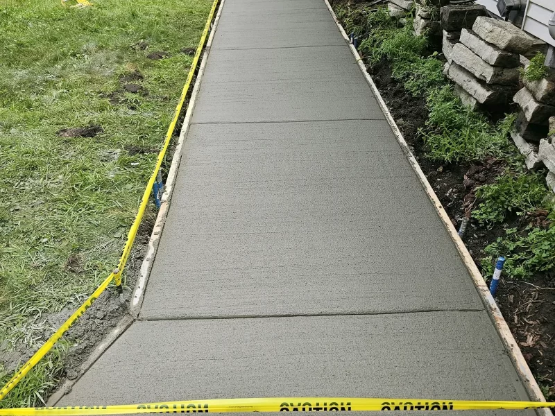 New concrete sidewalk installation